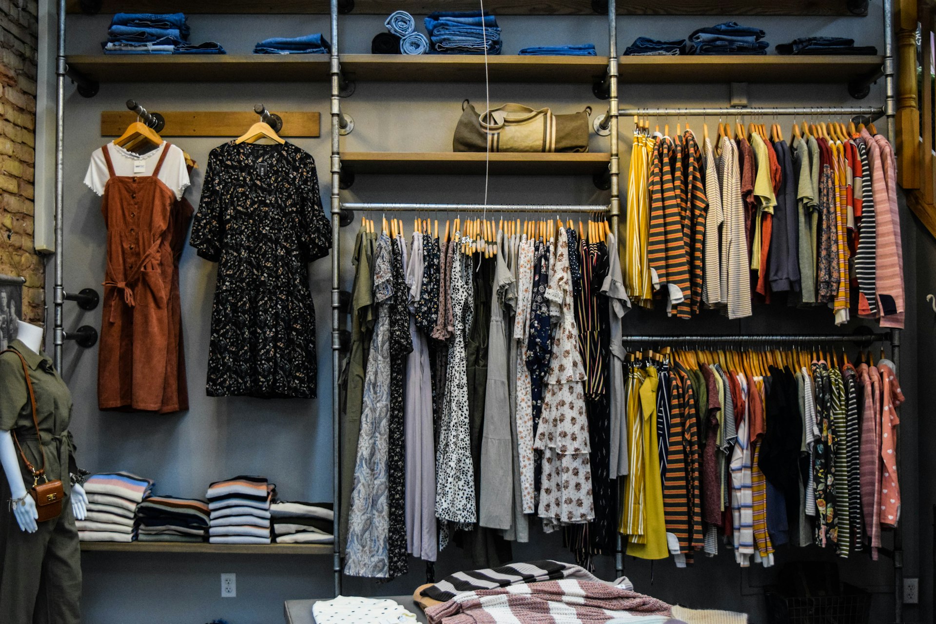 Apparel pieces folded and tagged at a fashion fulfilment station
