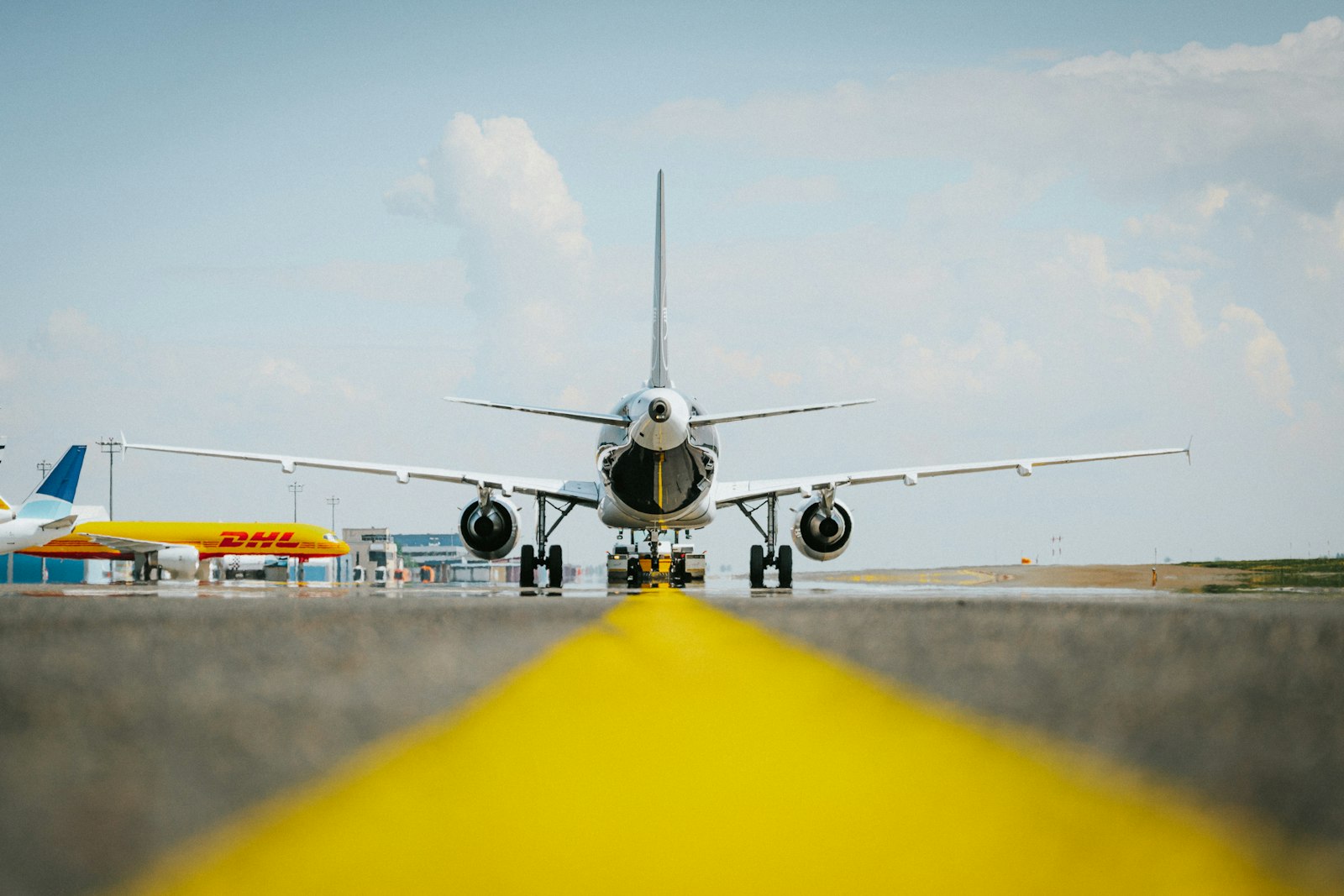 Air-cargo freighter on the runway preparing an international shipping lane