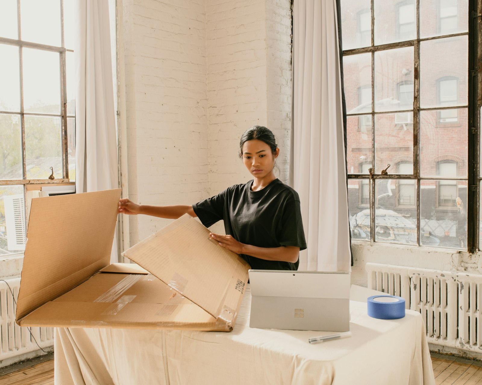 Subscription box kit being assembled with brand-curated items